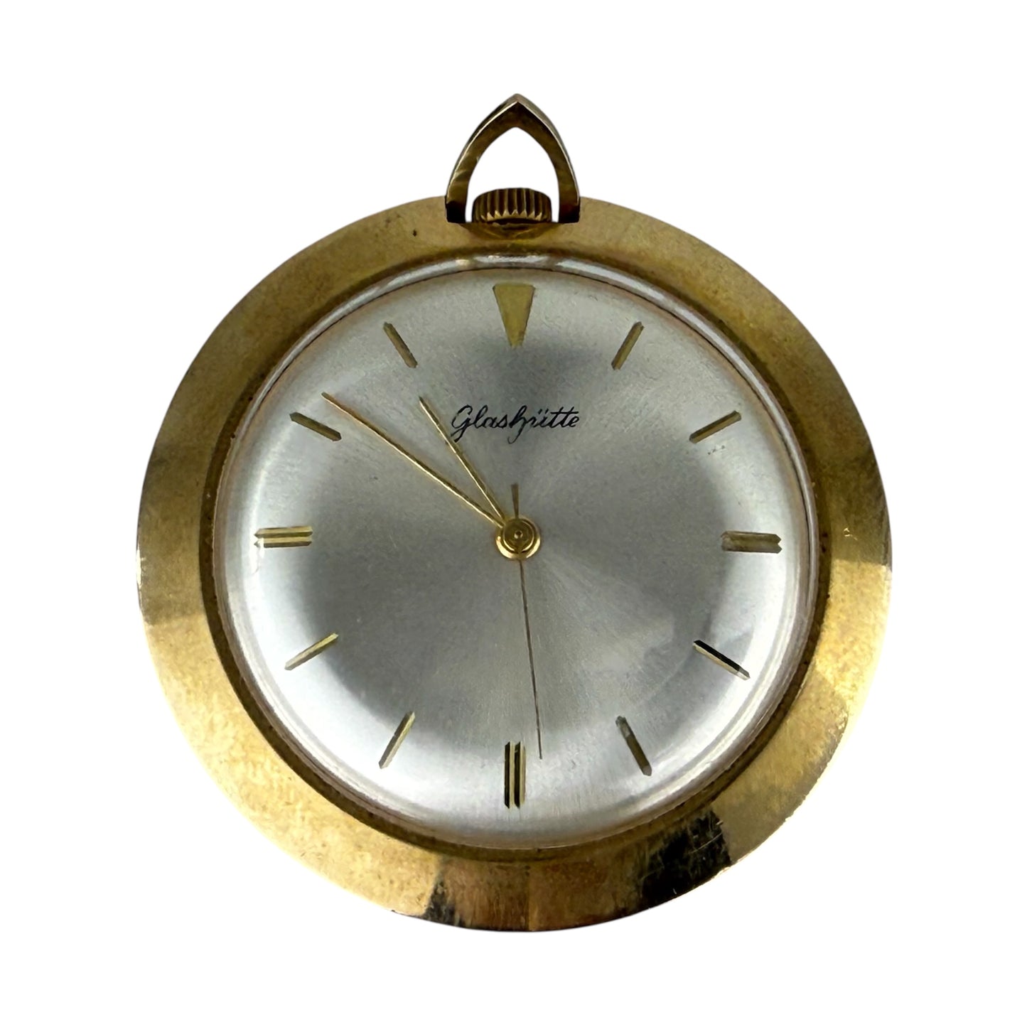 Vintage gold pocket watch with white face on a white background