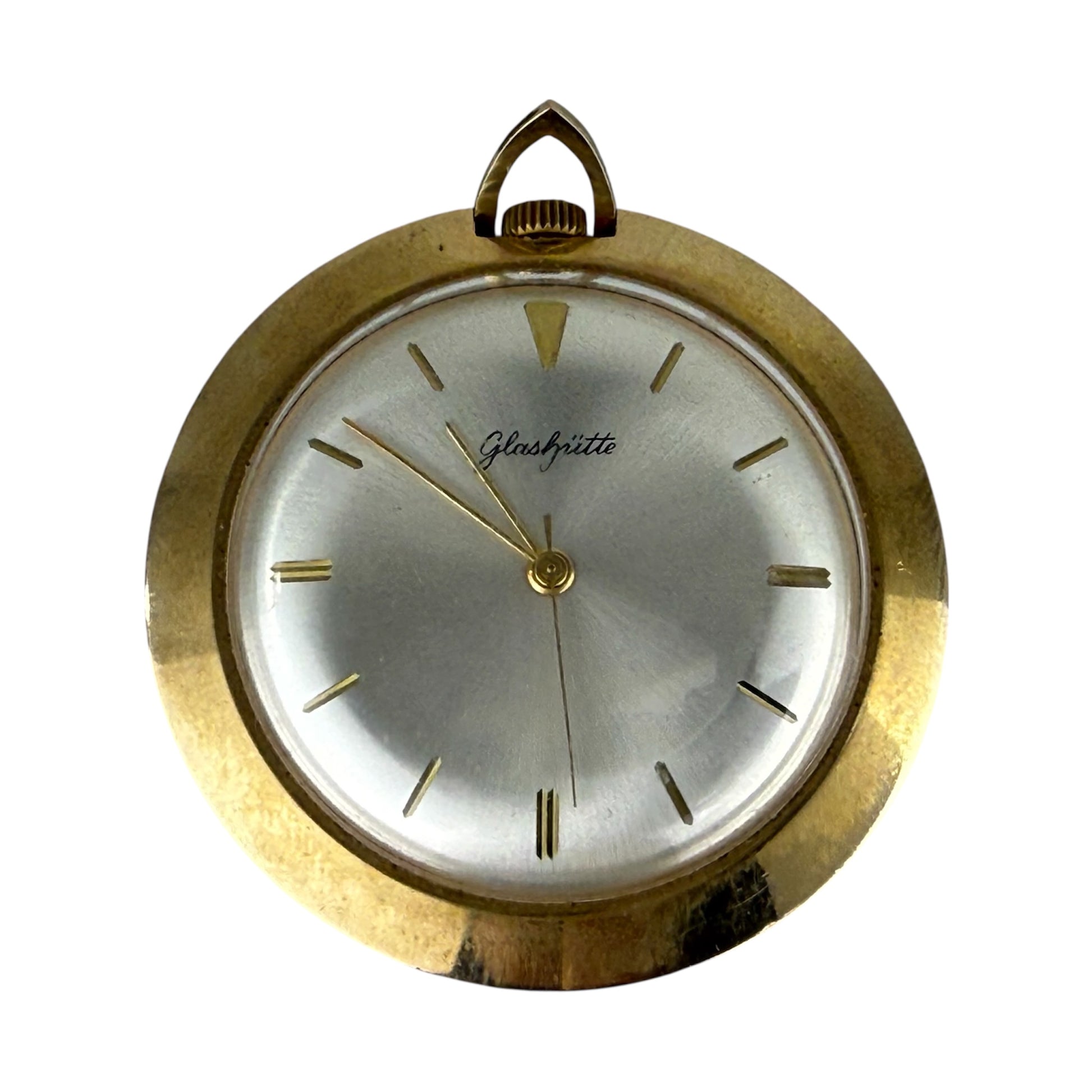 Vintage gold pocket watch with white face on a white background